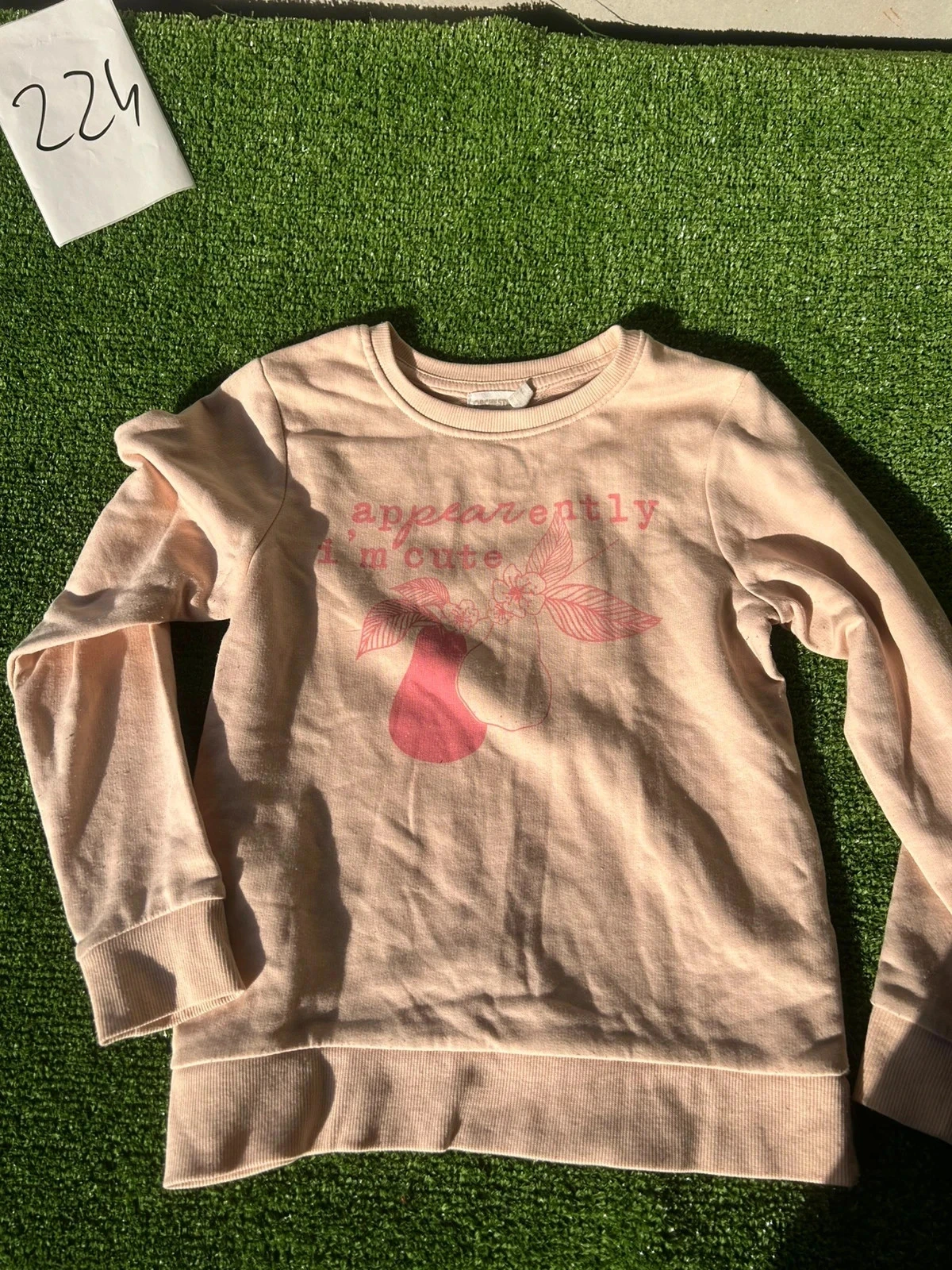 Pull beige abricot à motifs vintage orchestra